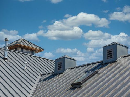 Will a Metal Roof Attract Light and Absorb Heat?